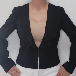 White House Black Market Black jacket with brooch on the front and pleated back